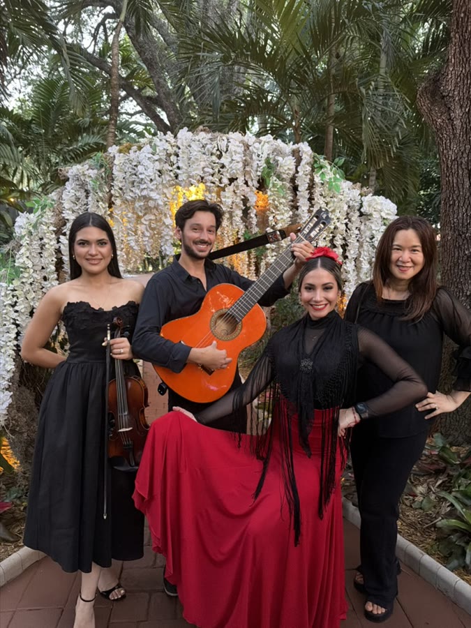 Sergio with a curated ensemble: violinist, flamenco dancer, and vocalist