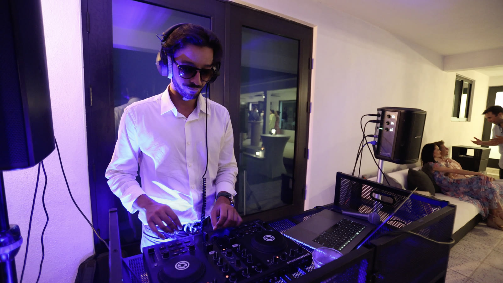 Sergio DJing and hosting a wedding reception